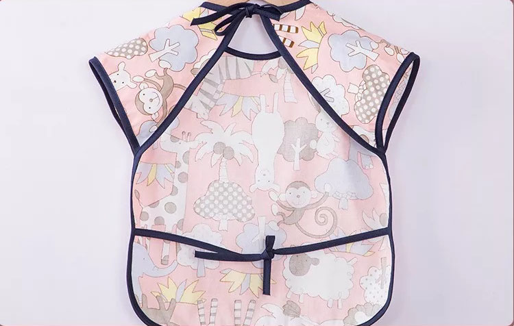 Σαλιάρα Αδιάβροχη Υφασμάτινη με τσέπη με δεινόσαυρους - Image 3